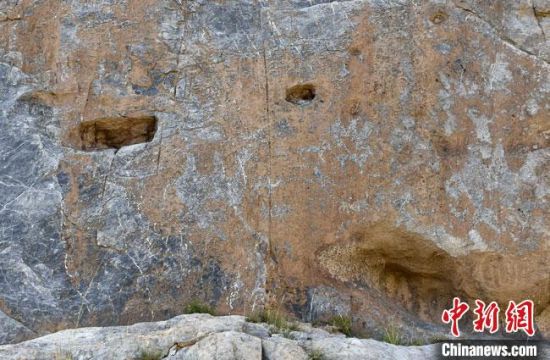 圖為動物巖畫。(資料圖) 呼和巴爾斯 攝